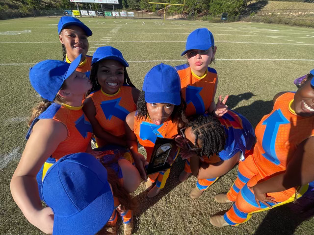 silly group selfie of color guard members in costume