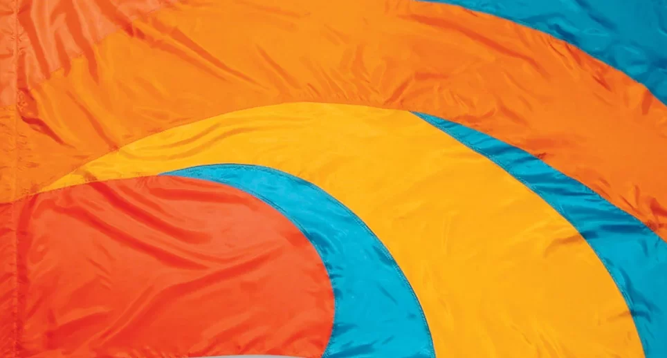 red, orange, blue, and yellow show flag