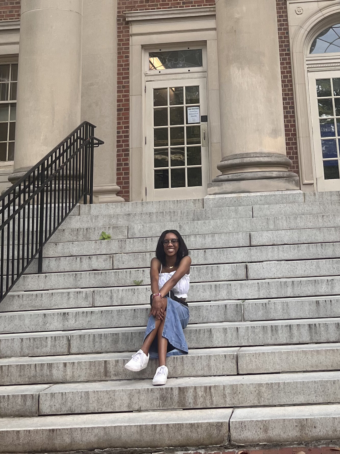 Me sitting on the front steps of Carrol Hall, at UNC-Chapel Hill