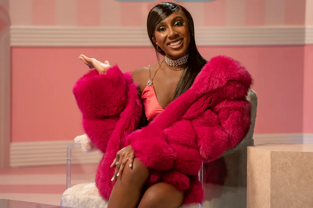 Ziwe Fumudoh in pink fur coat